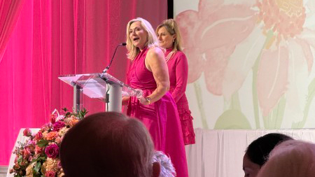 Stephanie J. Bond in conversation on stage with a fellow advocate