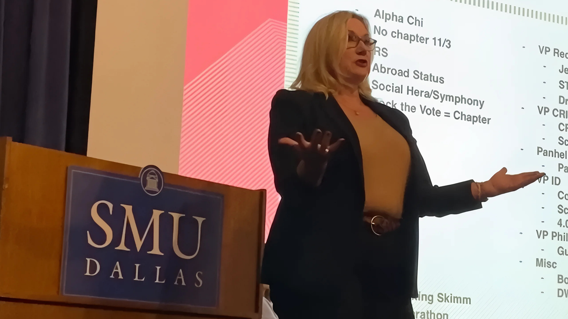 Stephanie J. Bond presenting at a podium at SMU Dallas
